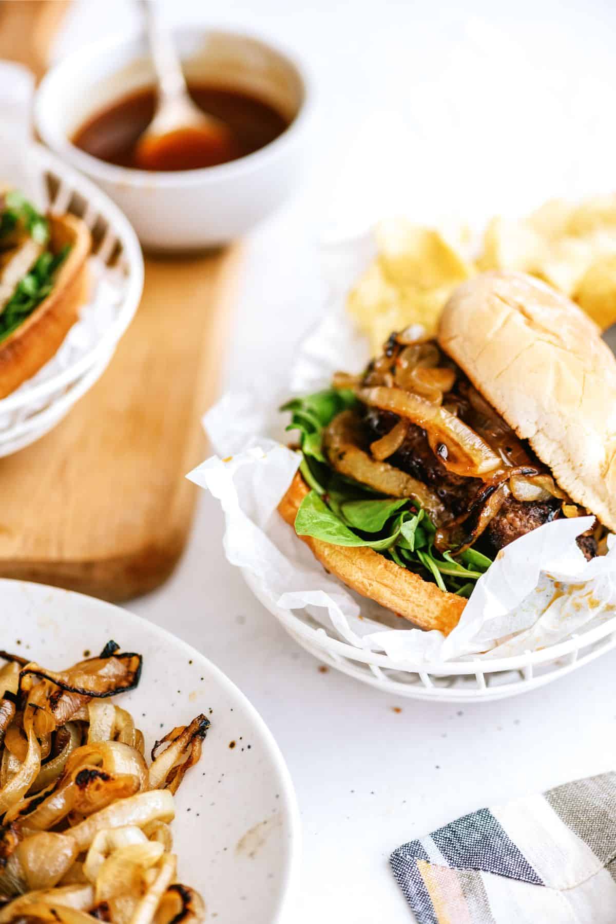 Grilled Teriyaki Burger in a basket with chips