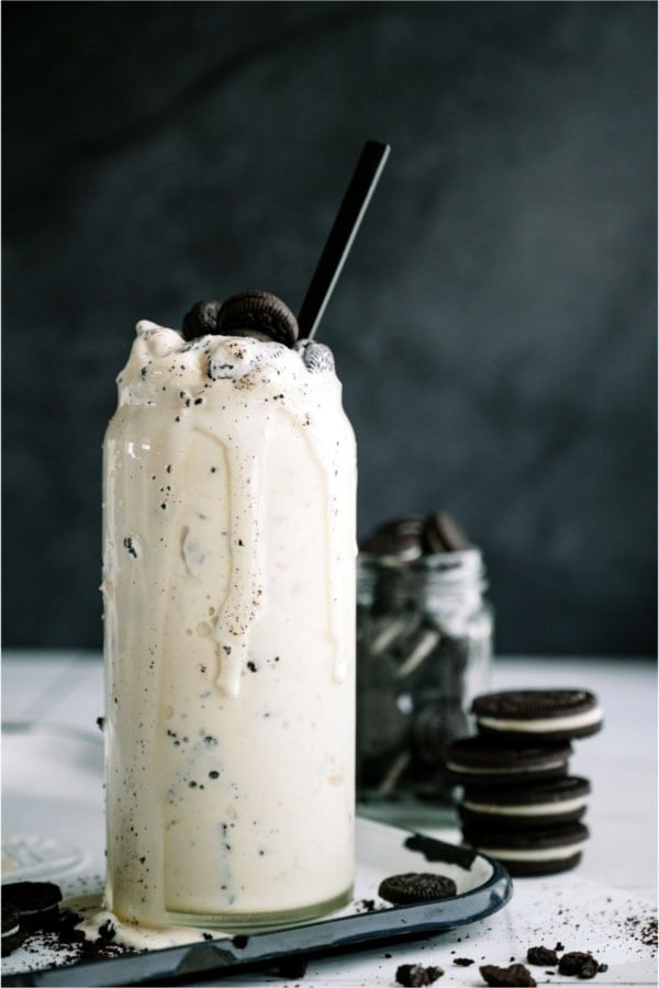 Copycat Dairy Queen Blizzard in a glass surrounded by Oreo cookies