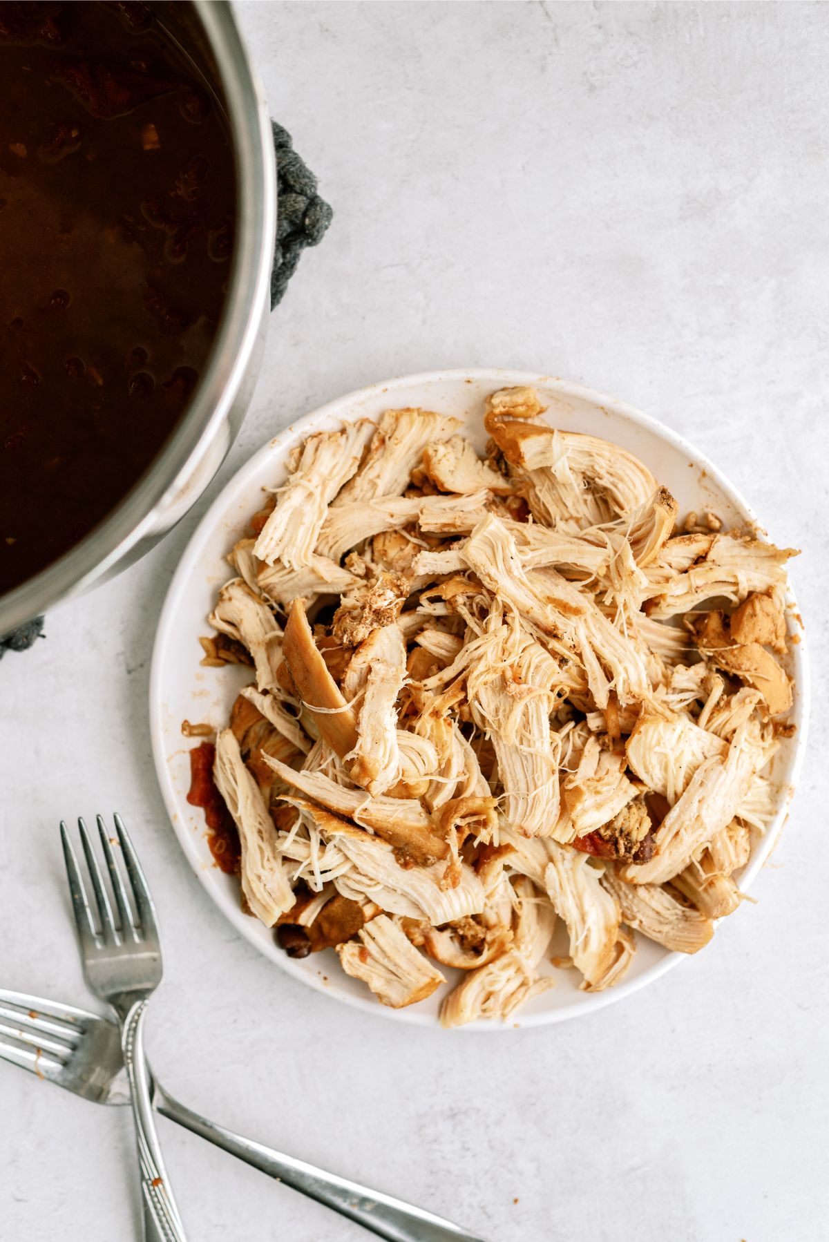 Chicken removed from Instant Pot and shredded