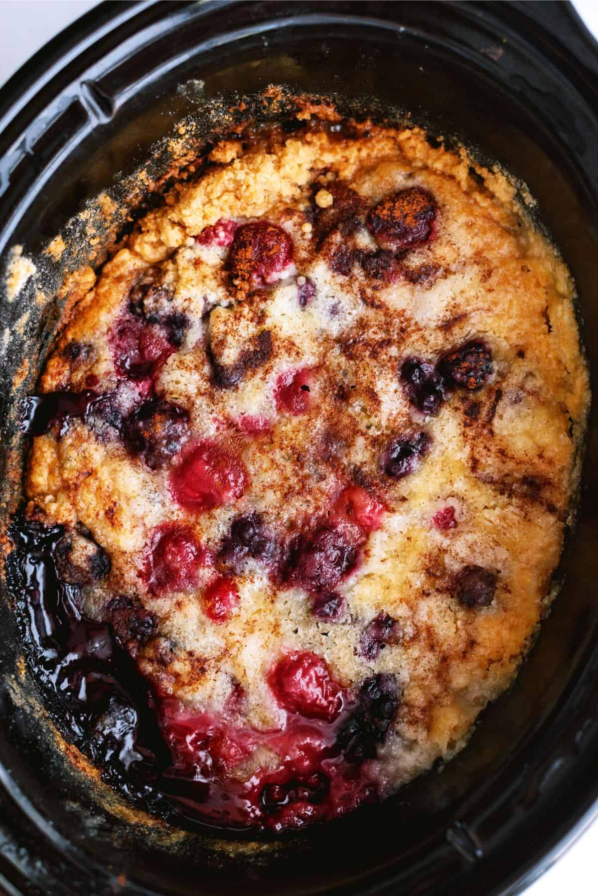 Slow Cooker Berry Cobbler in the slow cooker.