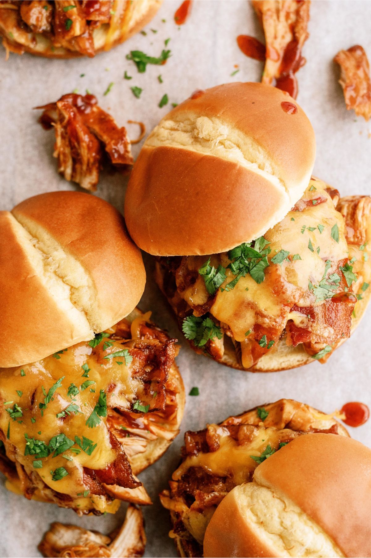 Top view of 3 Slow Cooker Cheesy BBQ Chicken Bacon Sandwiches