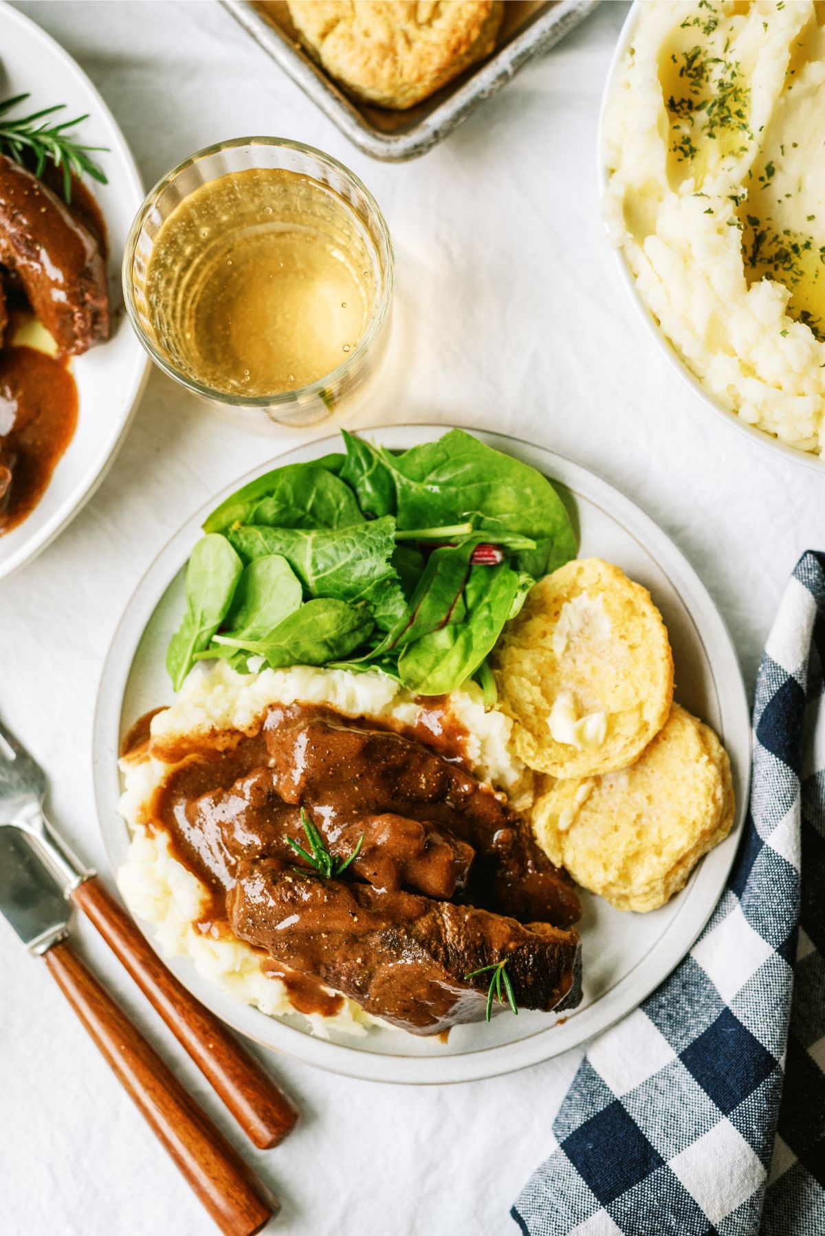 Top view of Slow Cooker Mississippi-Style Country Ribs served over mashed potatoes on a plate
