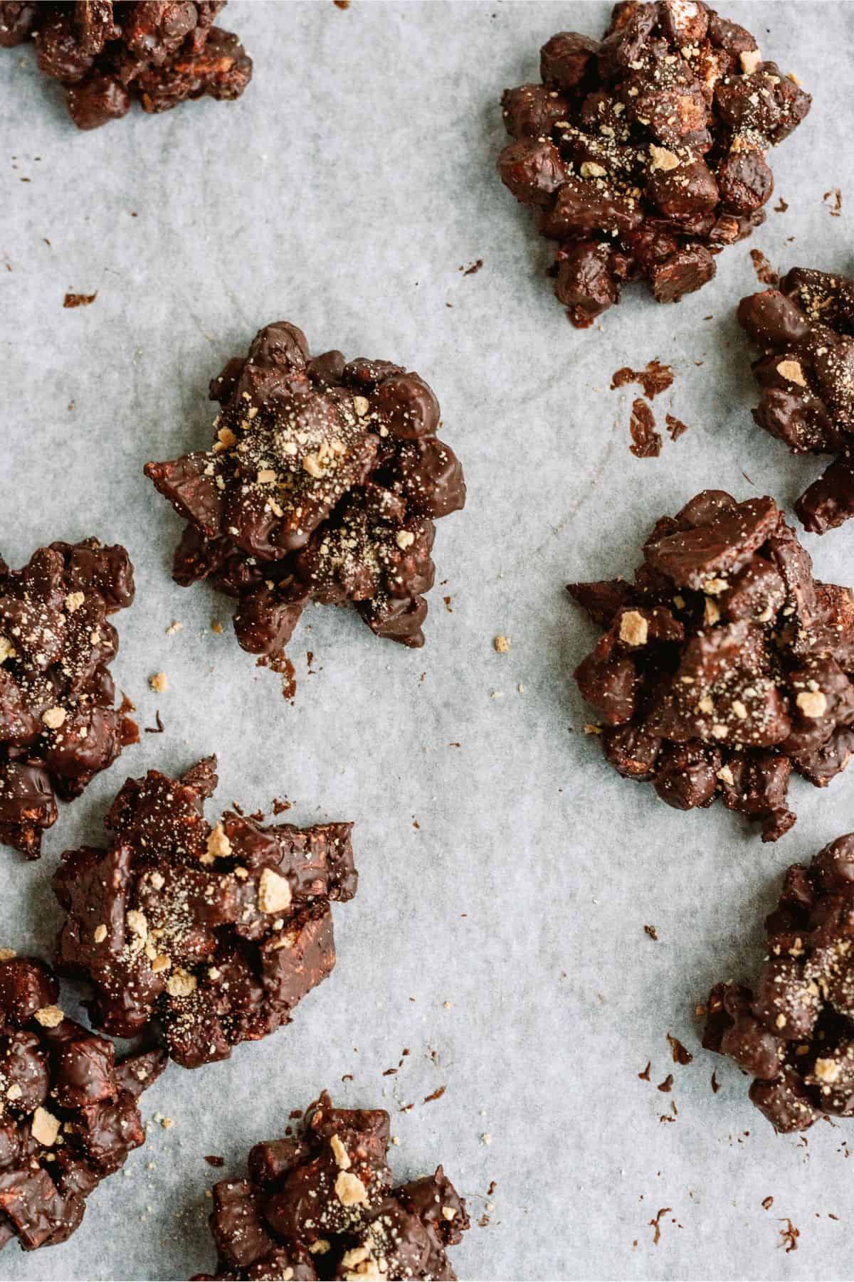 Top view of chocolate covered S’mores Clusters
on a baking sheet lined with wax paper.