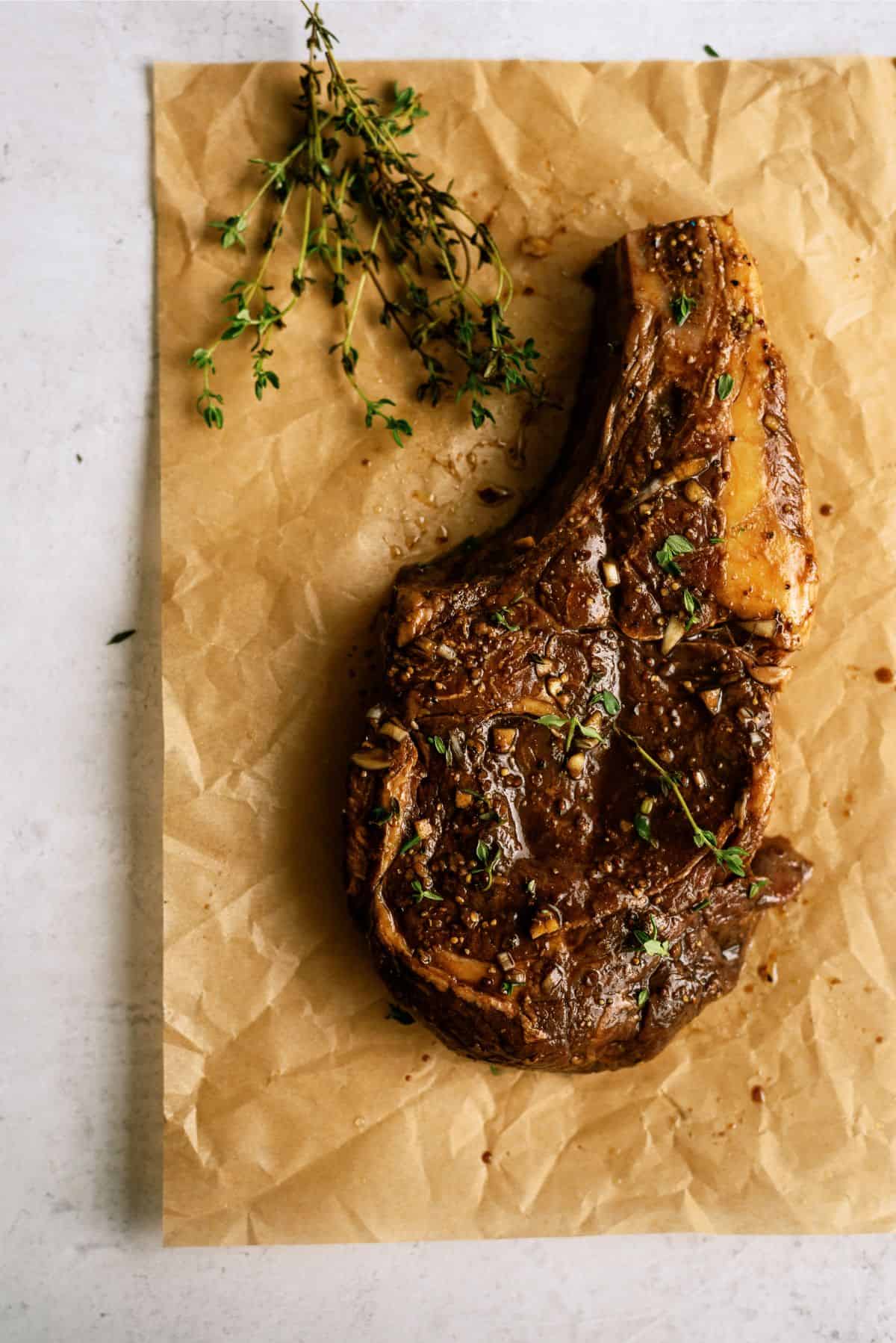 Tangy Marinated Steak on butcher paper