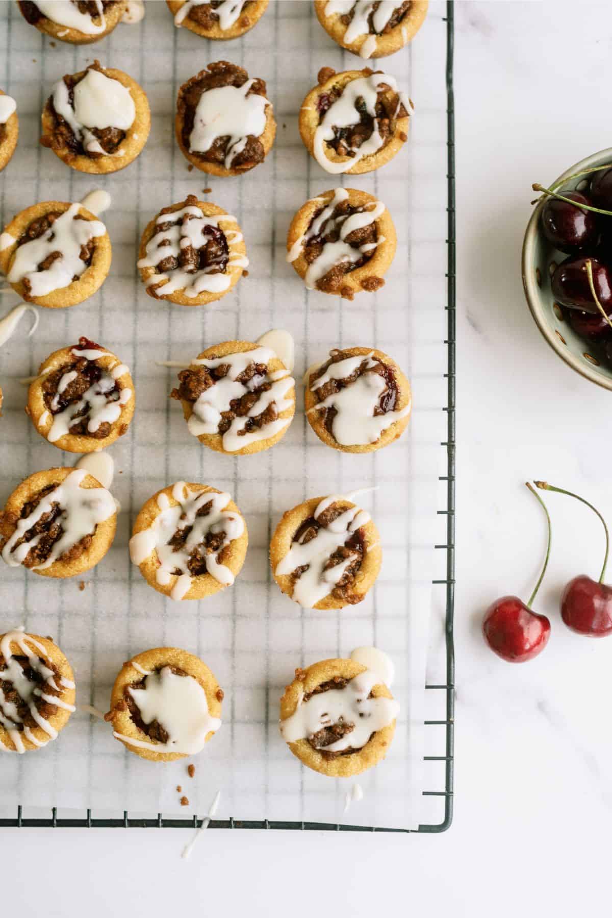 Top view of Cherry Cobbler Cookie Cups on a cooling rack.