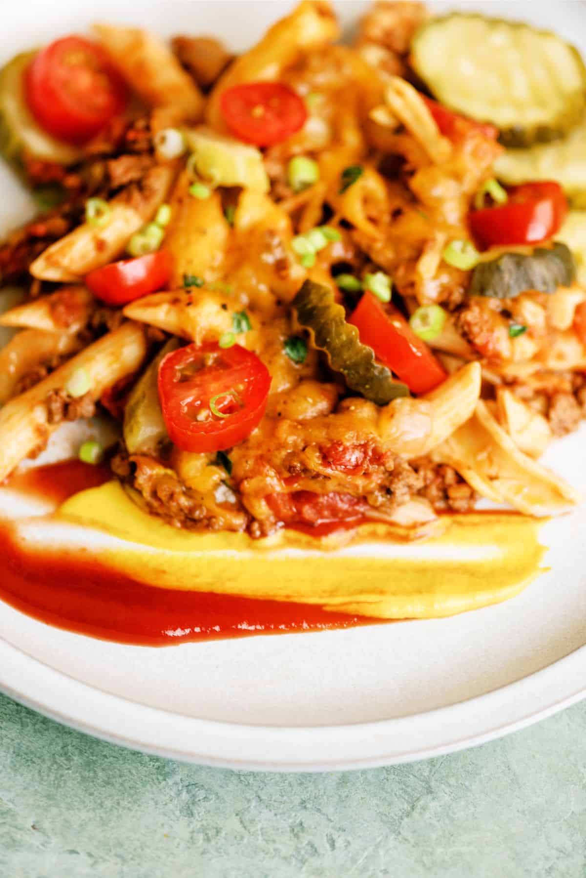 Close up of a serving of Easy Cheeseburger Casserole on a plate