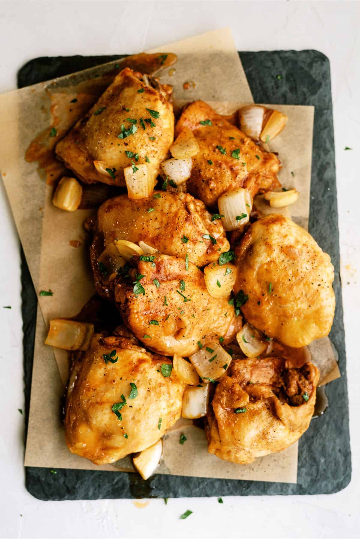 Top view of Slow Cooker BBQ Chicken Thighs on cutting board