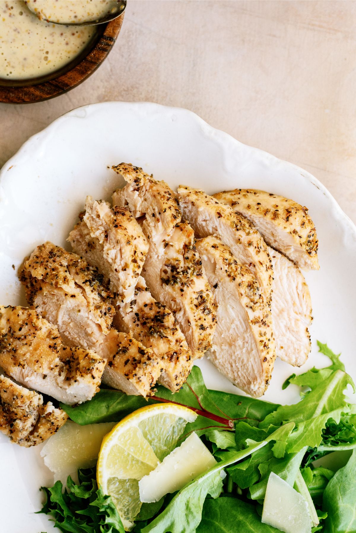 Sliced Air Fryer Chicken Breasts on a plate