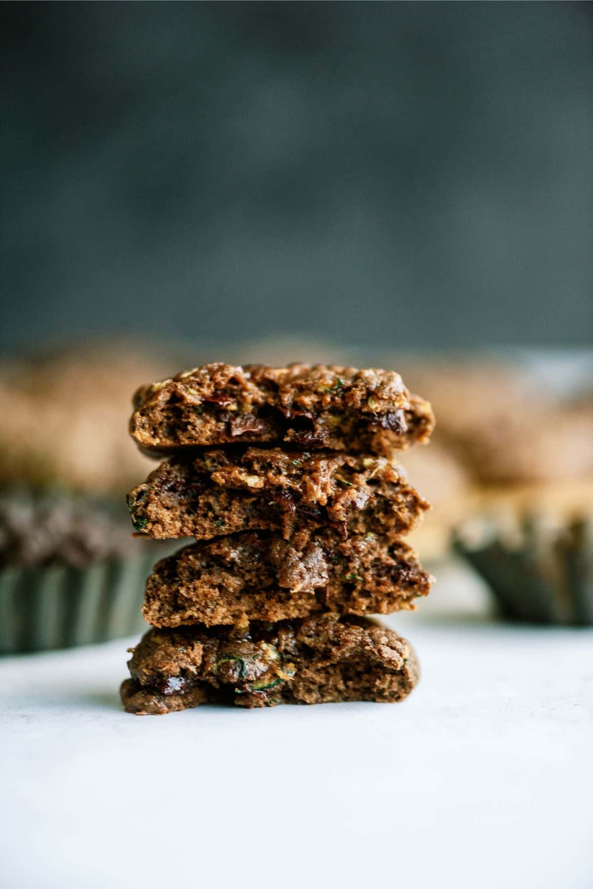 Double Chocolate Zucchini Cookies stacked and broken in half