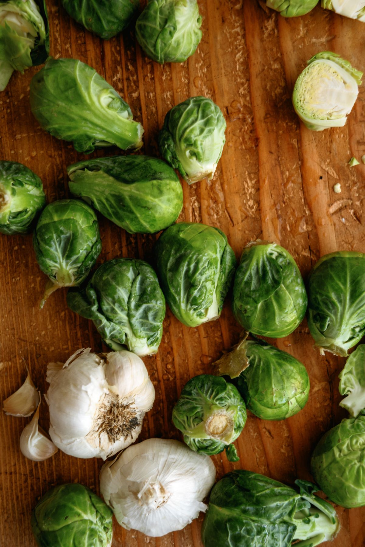Brussel Sprouts and Garlic on a cutting board