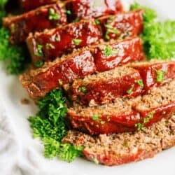 Meatloaf sliced on a cutting board
