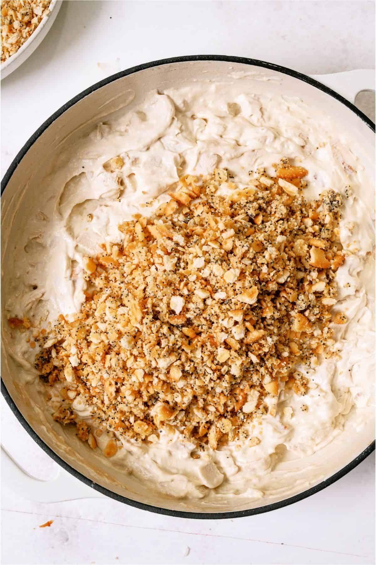 Ritz cracker mixture spread on top of chicken mixture.