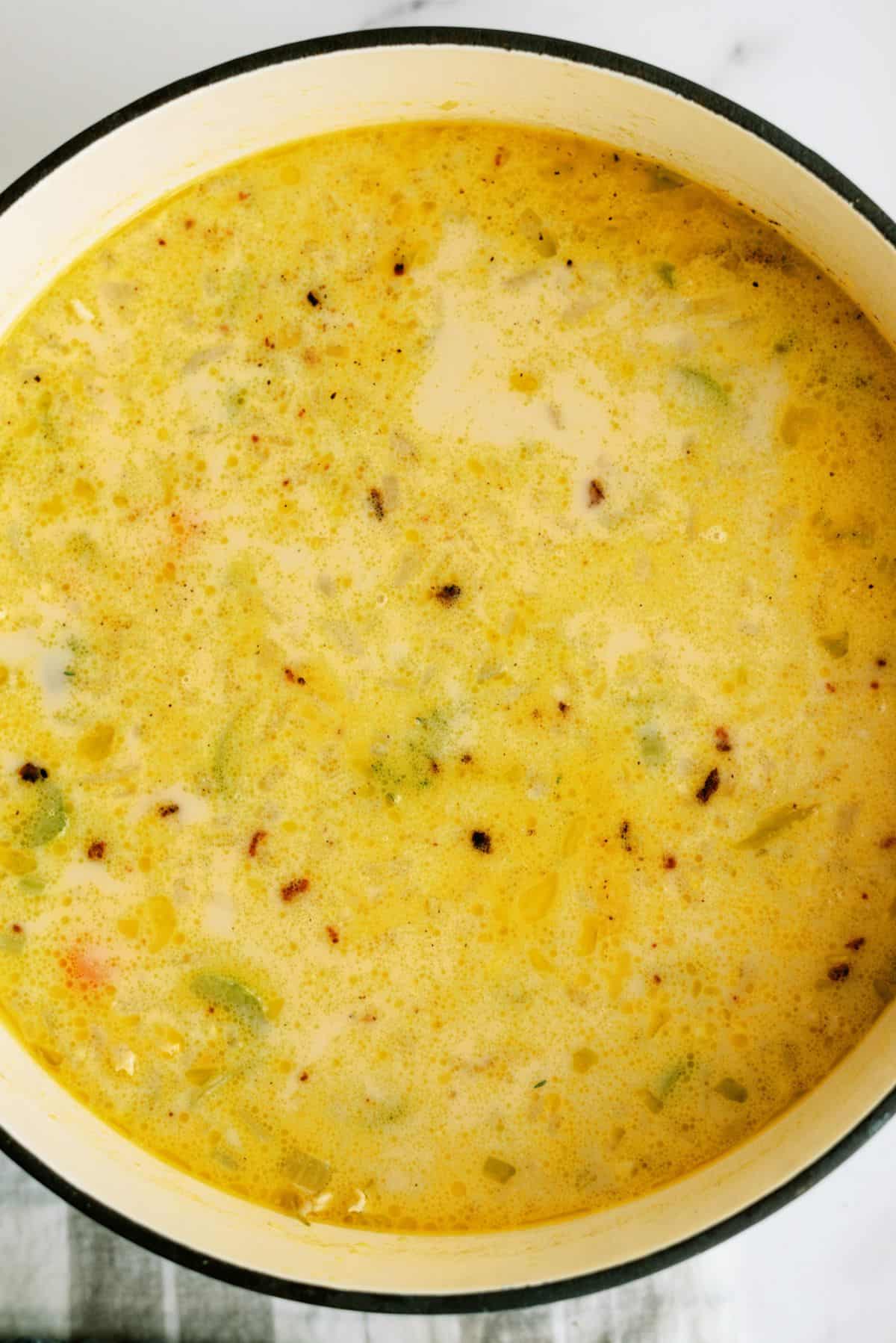 Creamy Chicken and Potato Soup in stock pot.