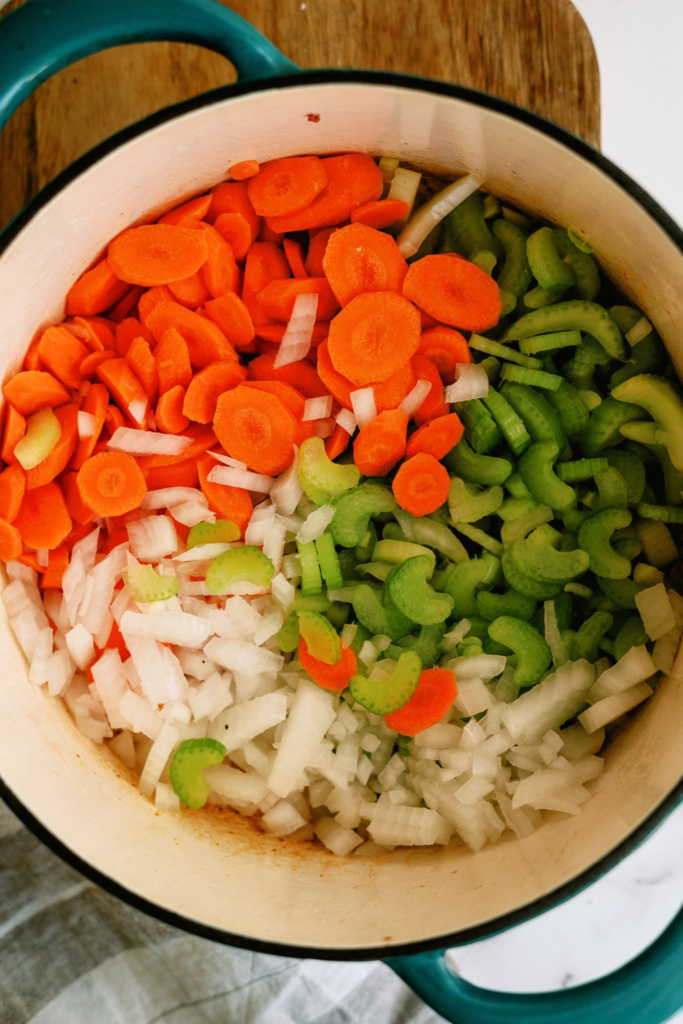 Chopped vegetables in stock pot