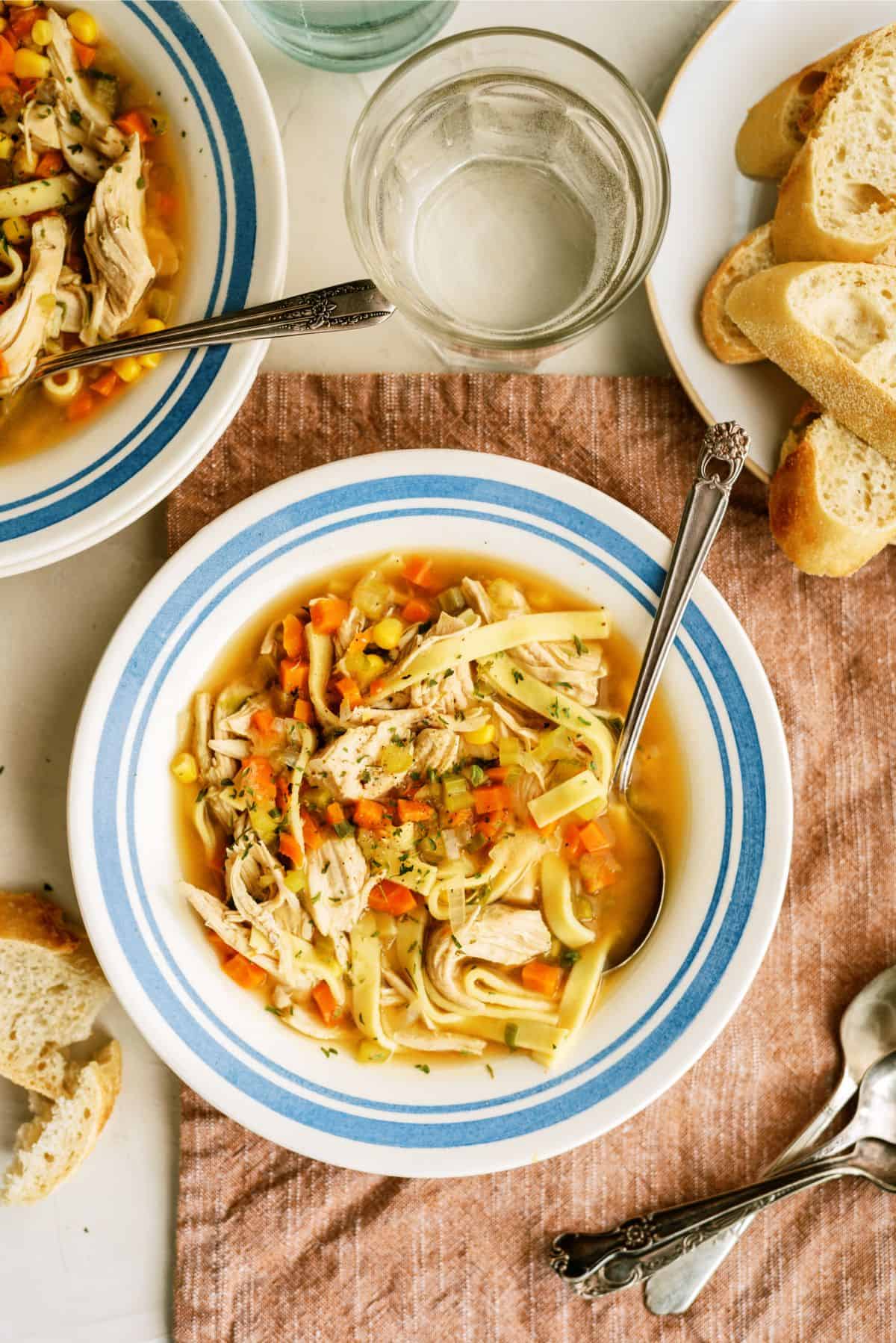 Instant Pot Chicken Noodle Soup in a bowl with a spoon