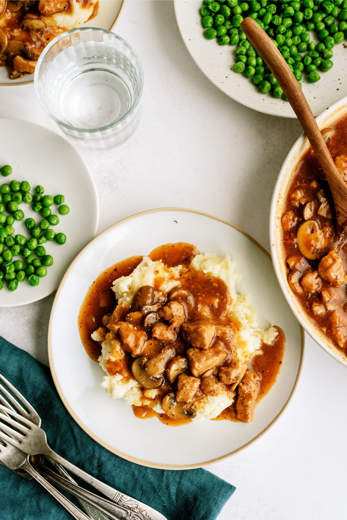 Top view of Instant Pot Pork Tips and Gravy served over a plate of mashed potatoes