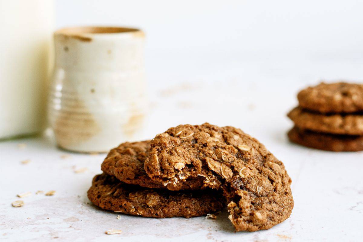 Stacked Oatmeal Gingerbread Cookies with one missing a bite