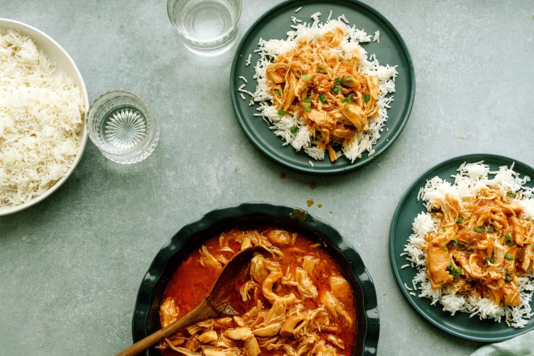 2 plates of Slow Cooker Apricot Chicken served over rice