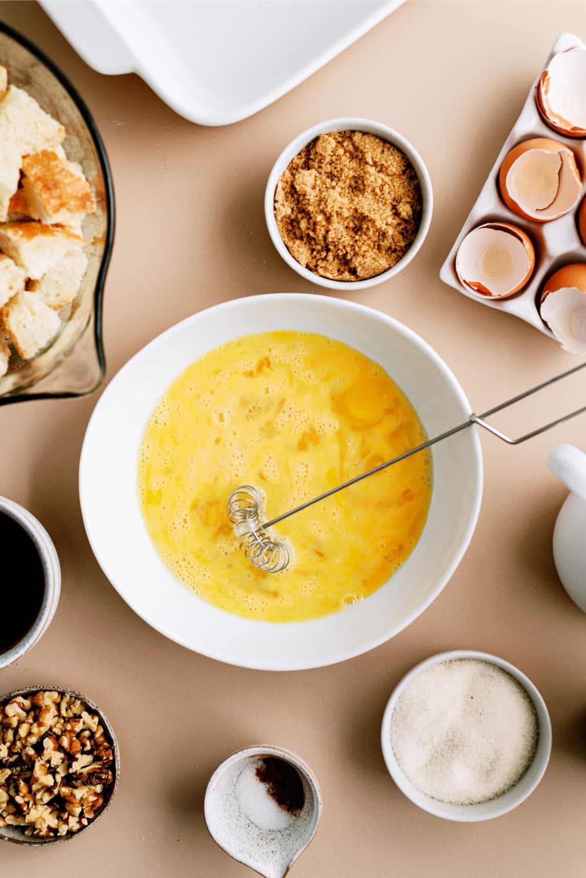 Eggs whisked with other ingredients in a bowl