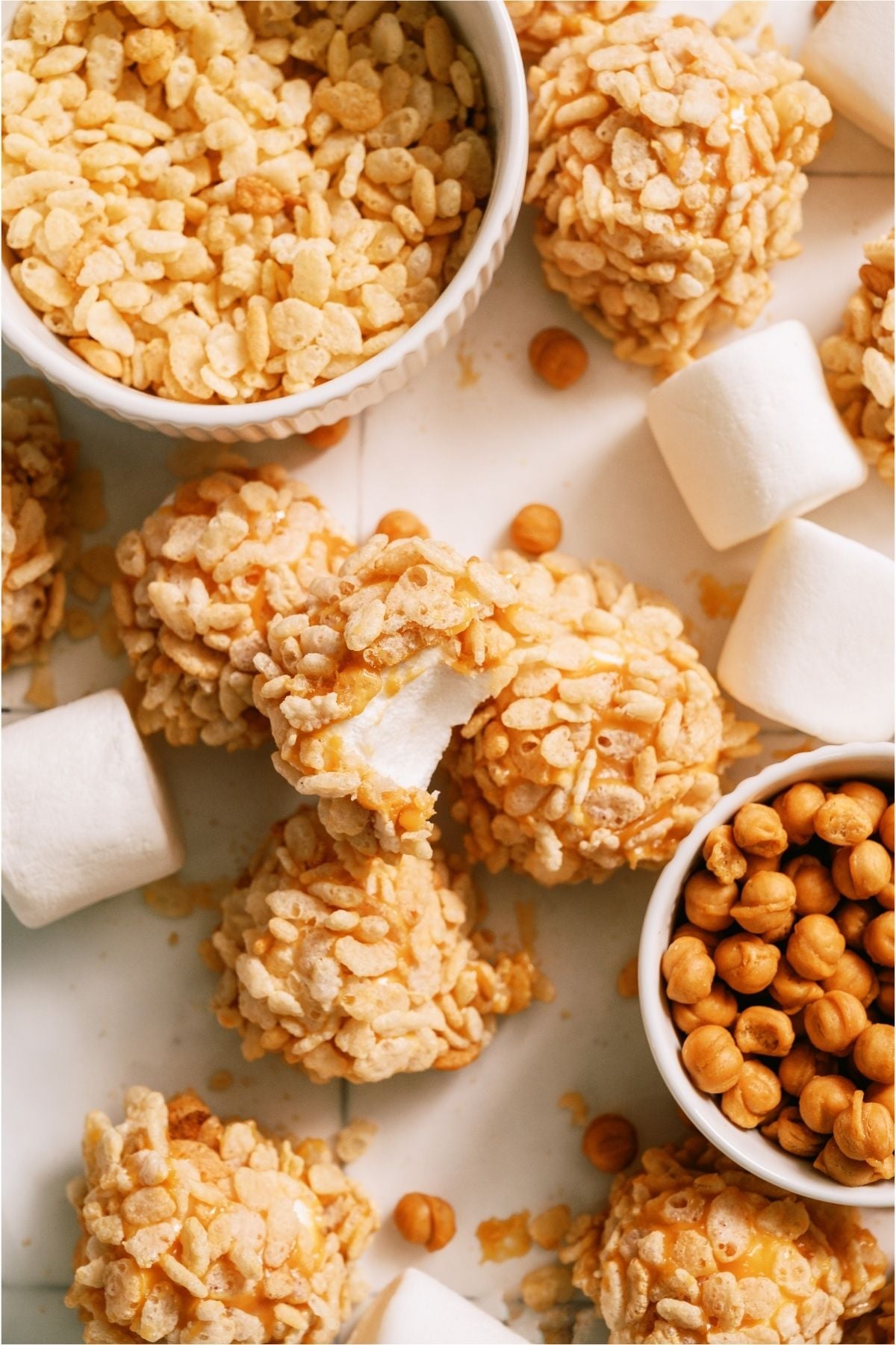 Top view of Caramel Marshmallow Rice Krispie Balls with caramel bits, marshmallows and rice crispie cereal.