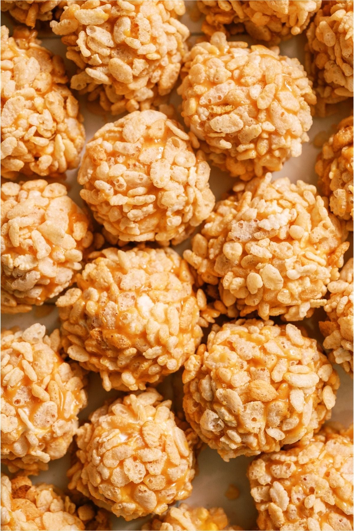 Top view of several Caramel Marshmallow Rice Krispie Balls.