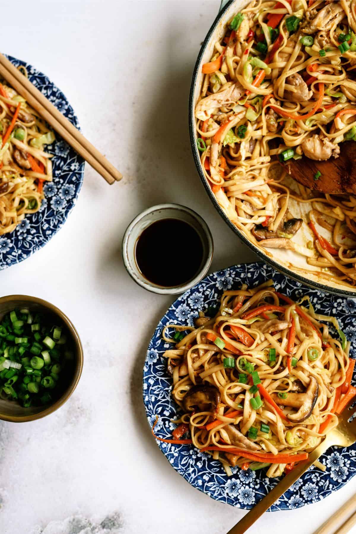 Plate of Chow Mein with the remaining Chow Mein Recipe in the pan