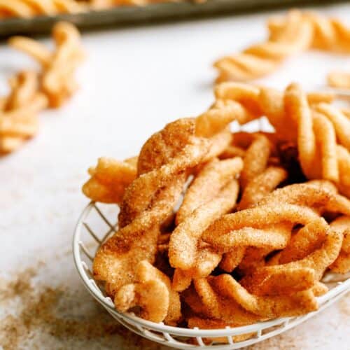 Copycat Taco Bell Cinnamon Twists in a wire basket.