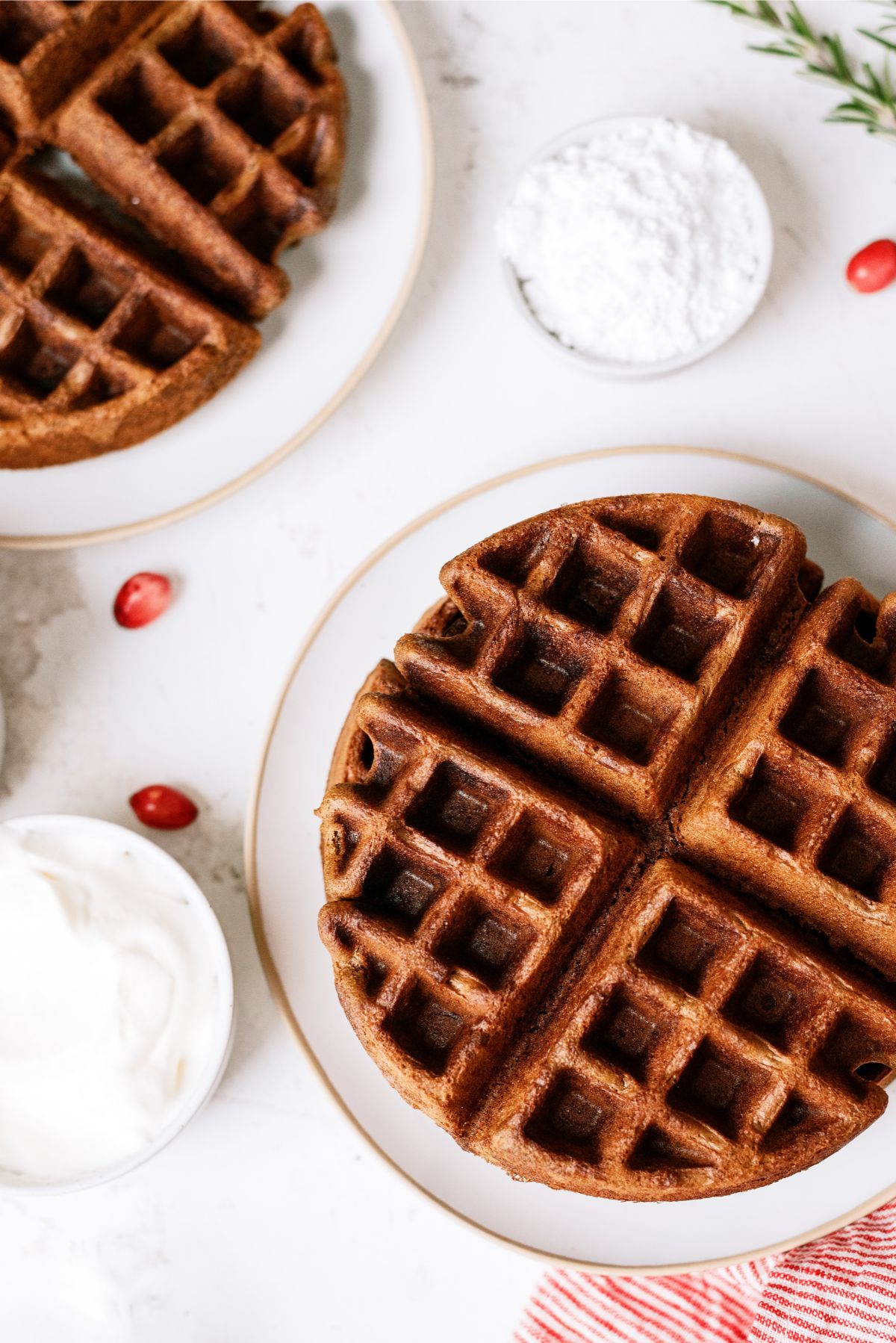Two plates with plain Gingerbread Waffles 