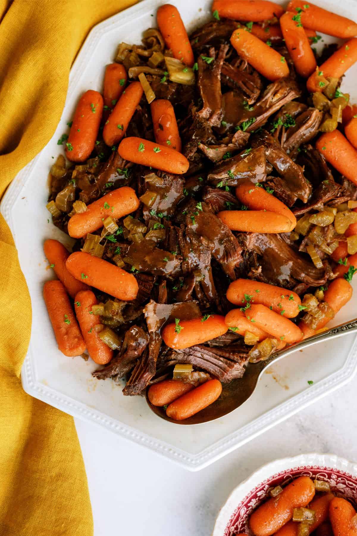 Shredded Slow Cooker Balsamic Pot Roast on a serving plate