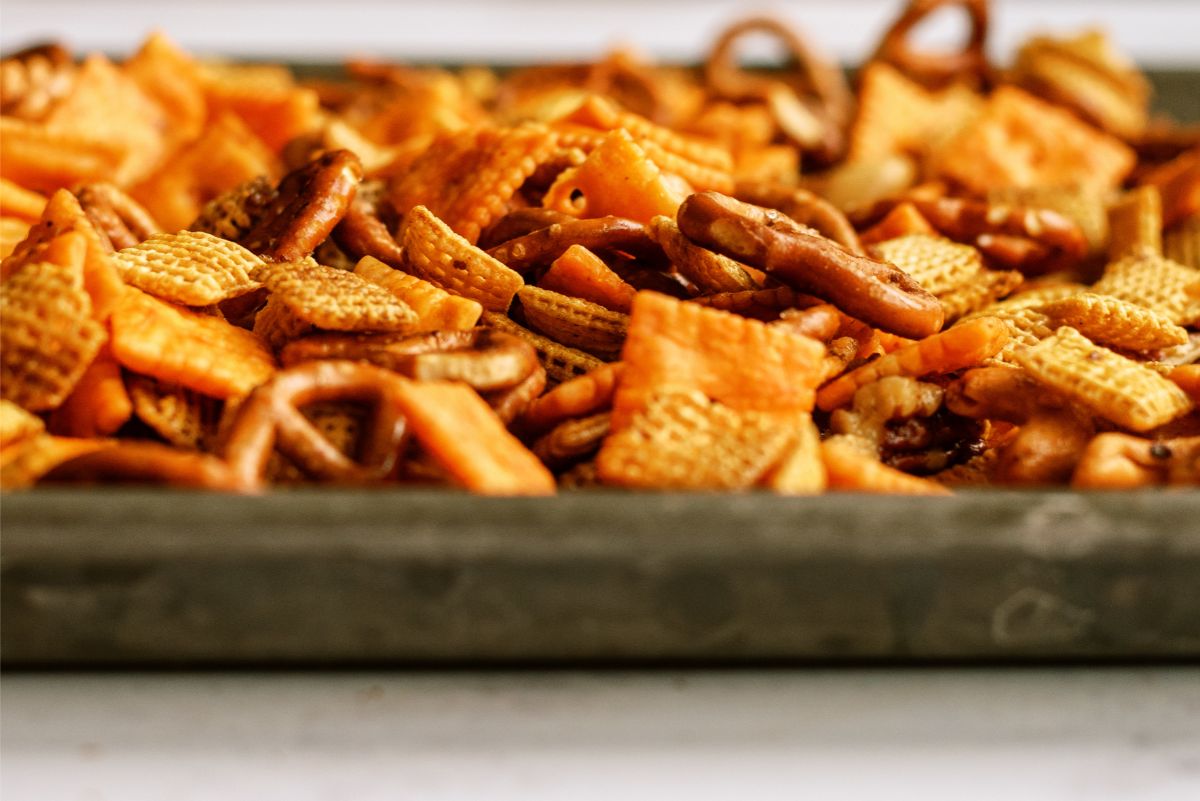 Close up of Slow Cooker Savory Chex Mix on a sheet pan