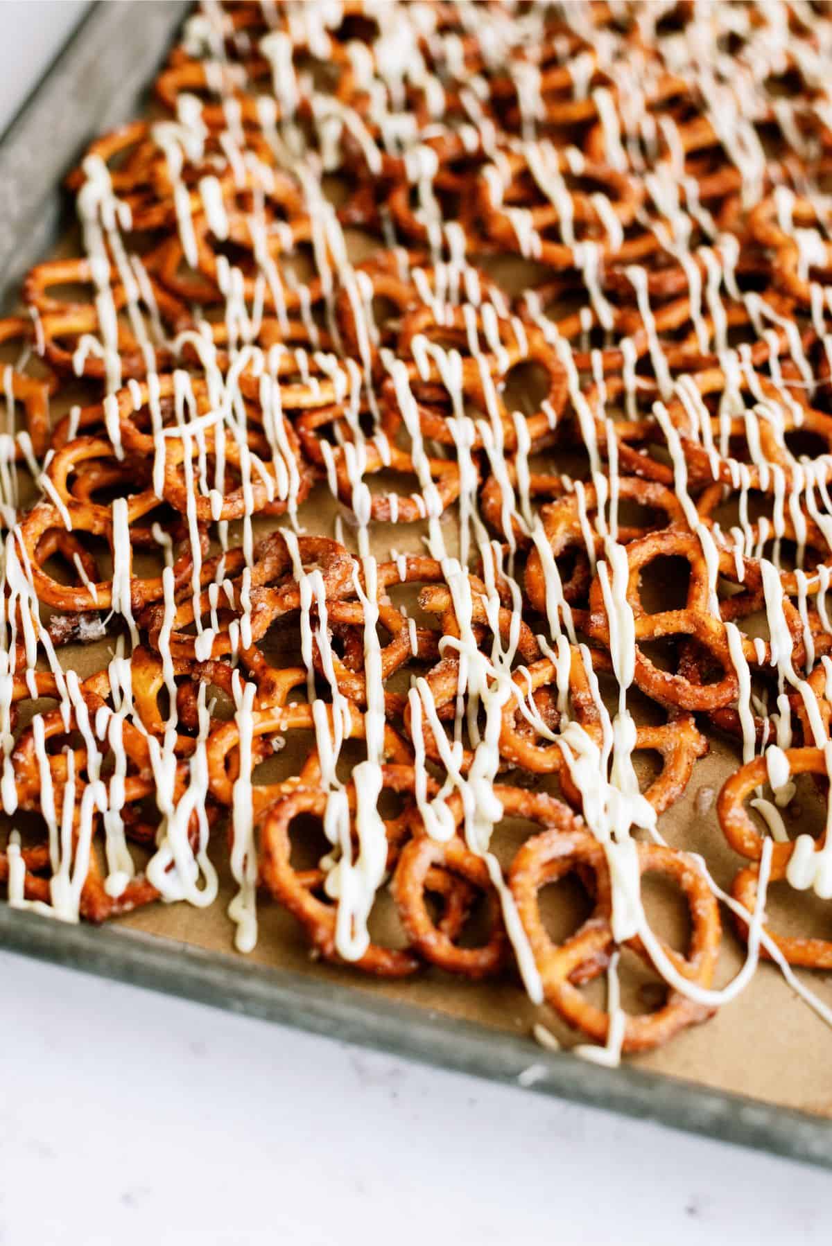 White Chocolate Cinnamon Sugar Pretzels on a sheet pan