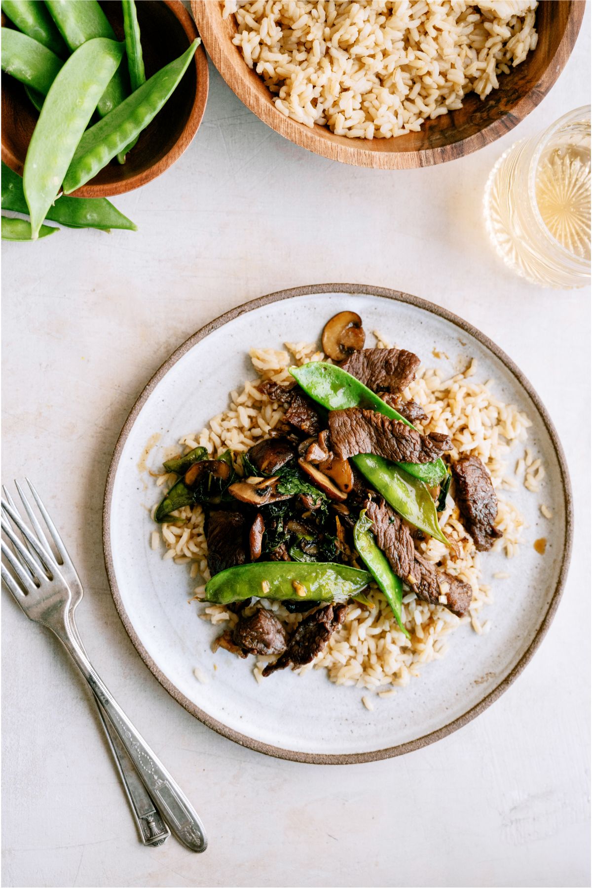 A plate of Asian Beef and Snow Peas