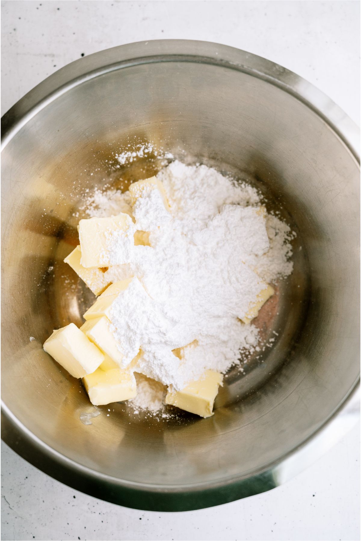 Butter and powdered sugar in a large mixing bowl