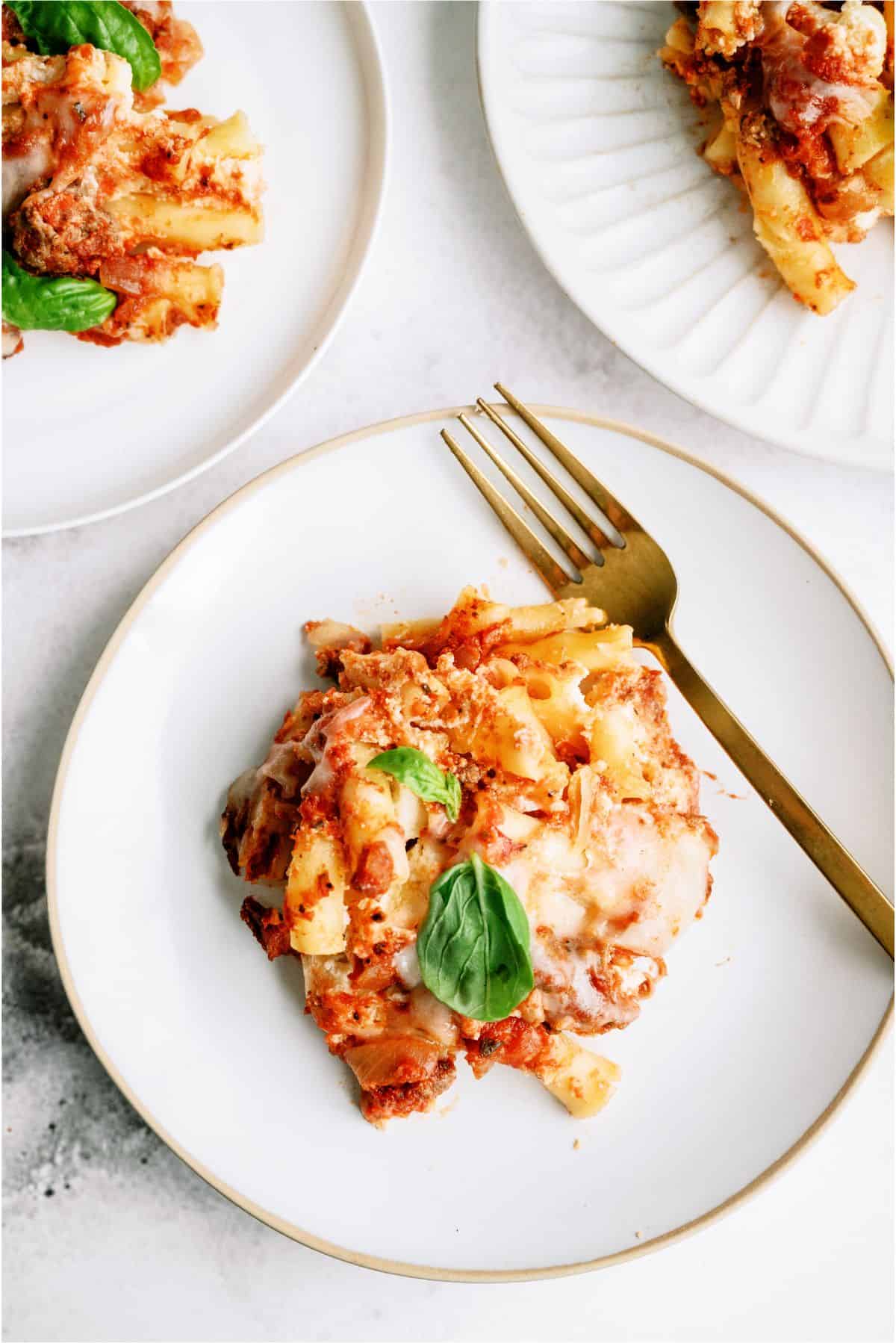 Top view of a plate of Slow Cooker Baked Ziti with a fork