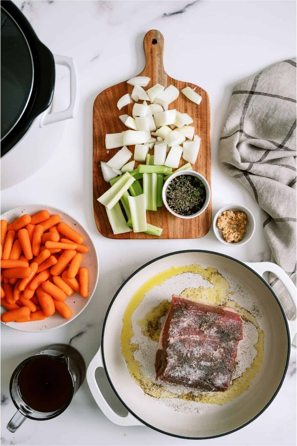 Ingredients needed to make Slow Cooker Perfect Pot Roast and Homemade Gravy.