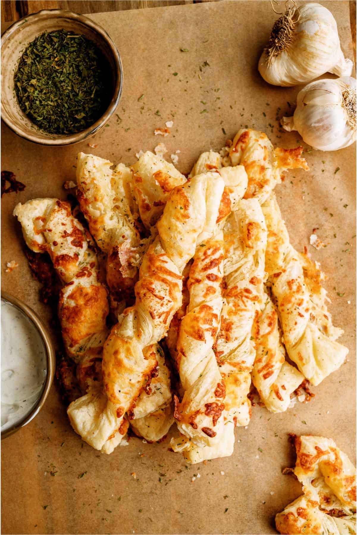 Top view of Twisted Cheese Breadsticks in a pile