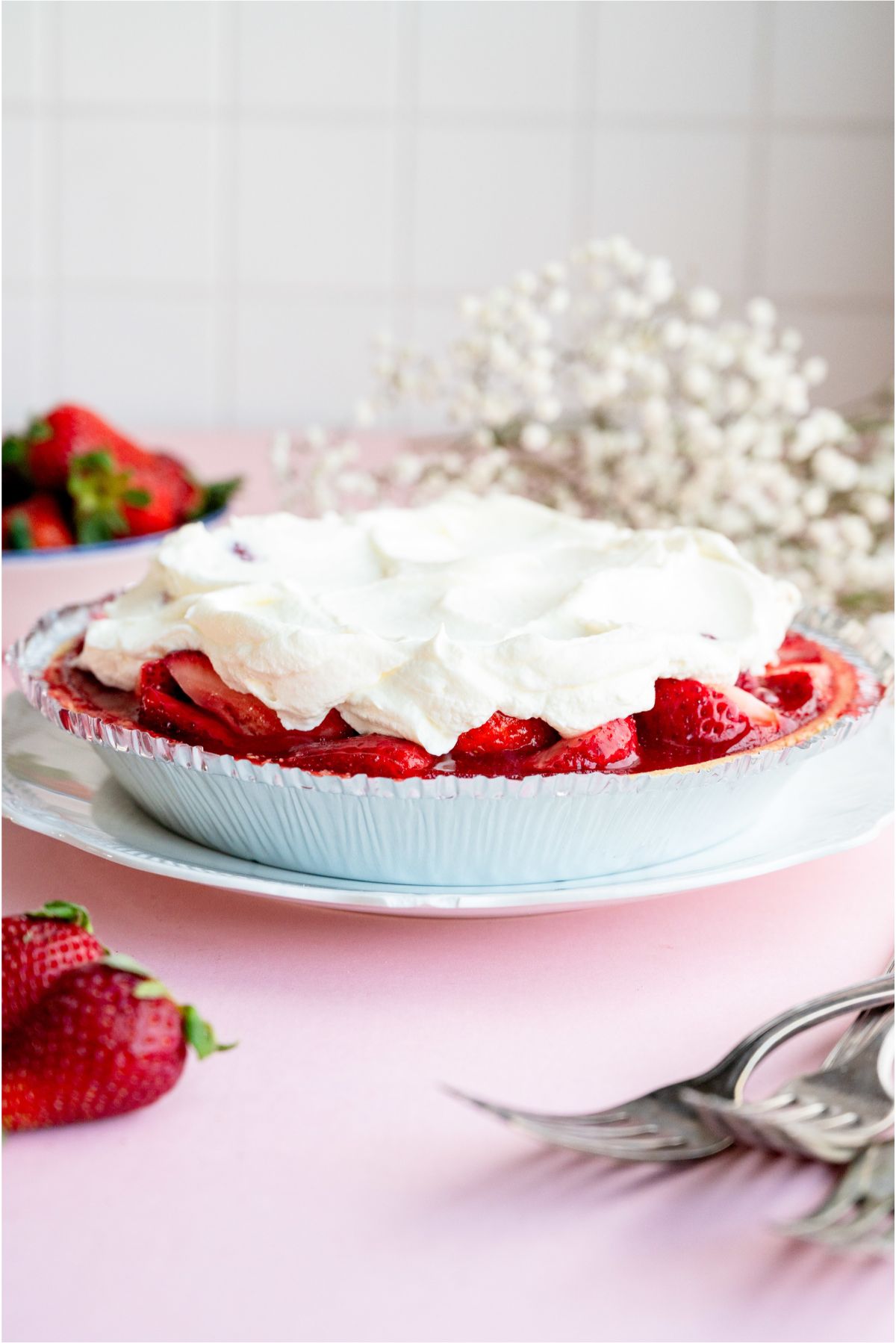 Fresh Strawberry PIe topped with whipped cream