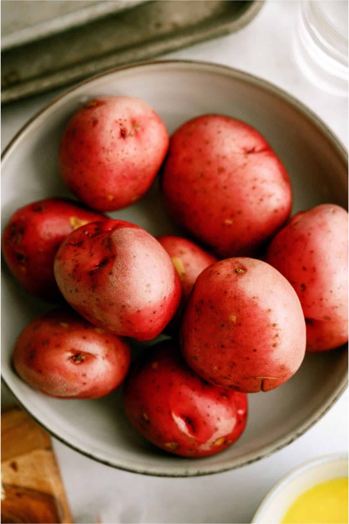 Cleaned  red potatoes in a bowl