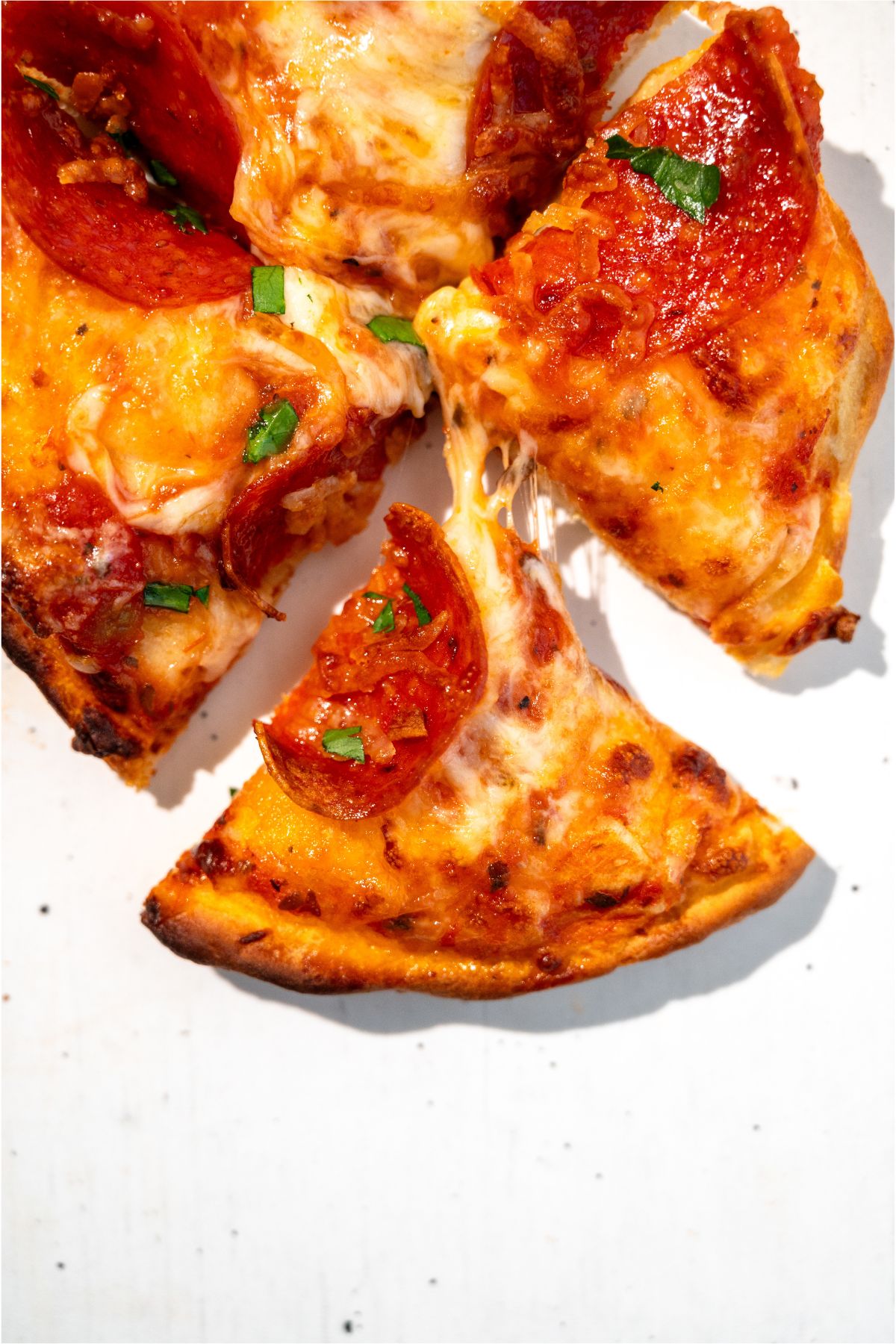 Air Fryer Pizza cut into triangle slices