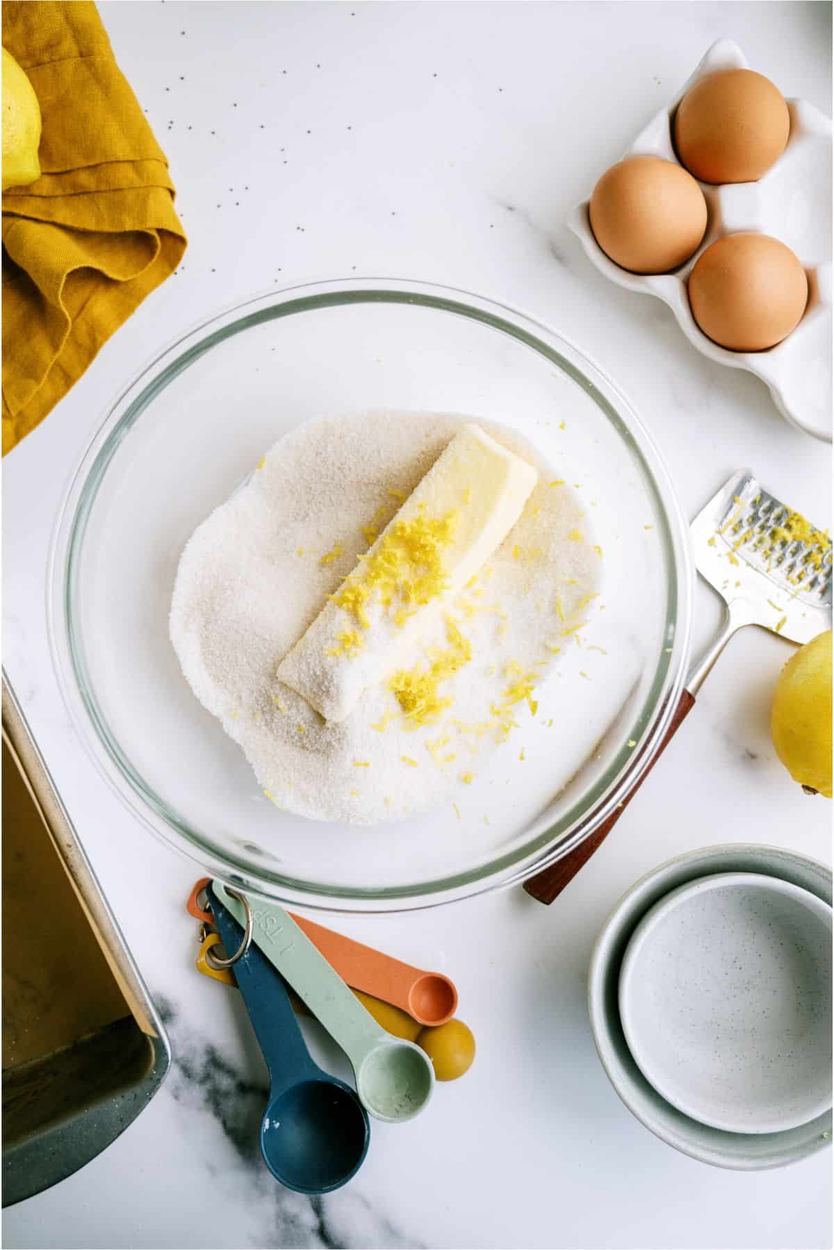 Dry ingredients with butter in a mixing bowl