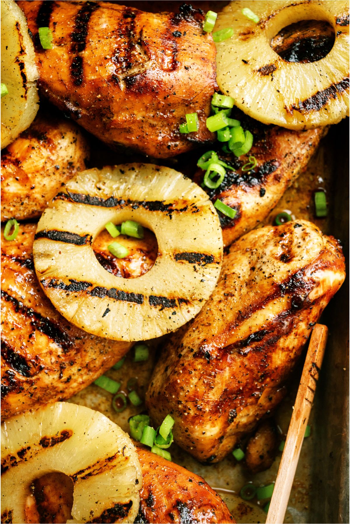 Close up view of Grilled Pineapple Teriyaki Chicken on a pan