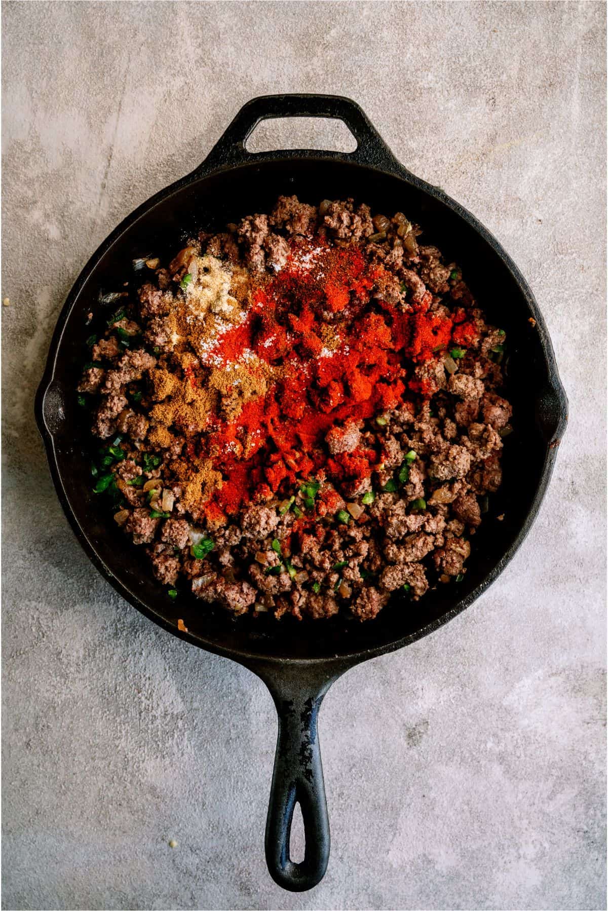 seasoned ground beef in a skillet