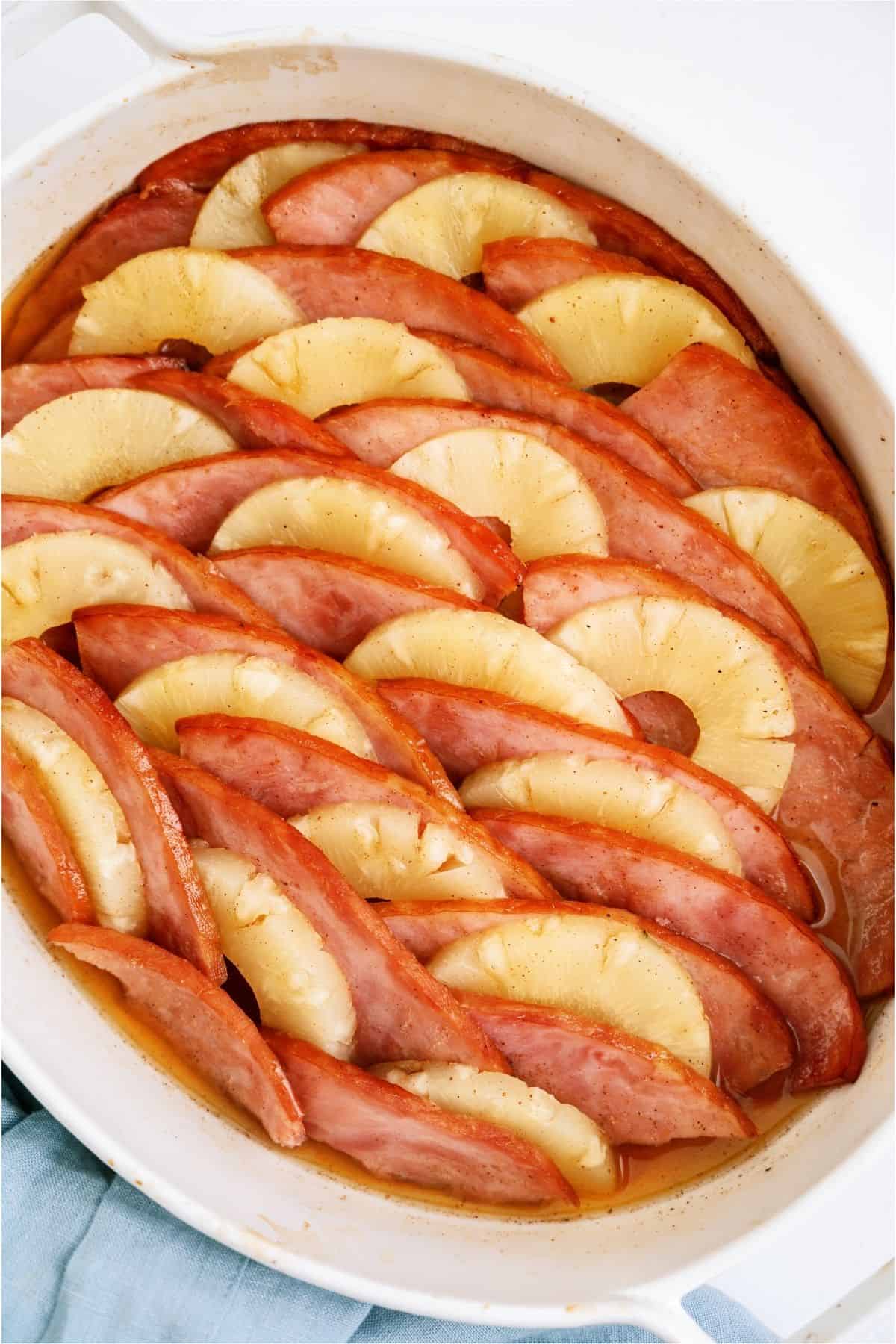 Ham and Pineapple Bake in a white casserole dish.