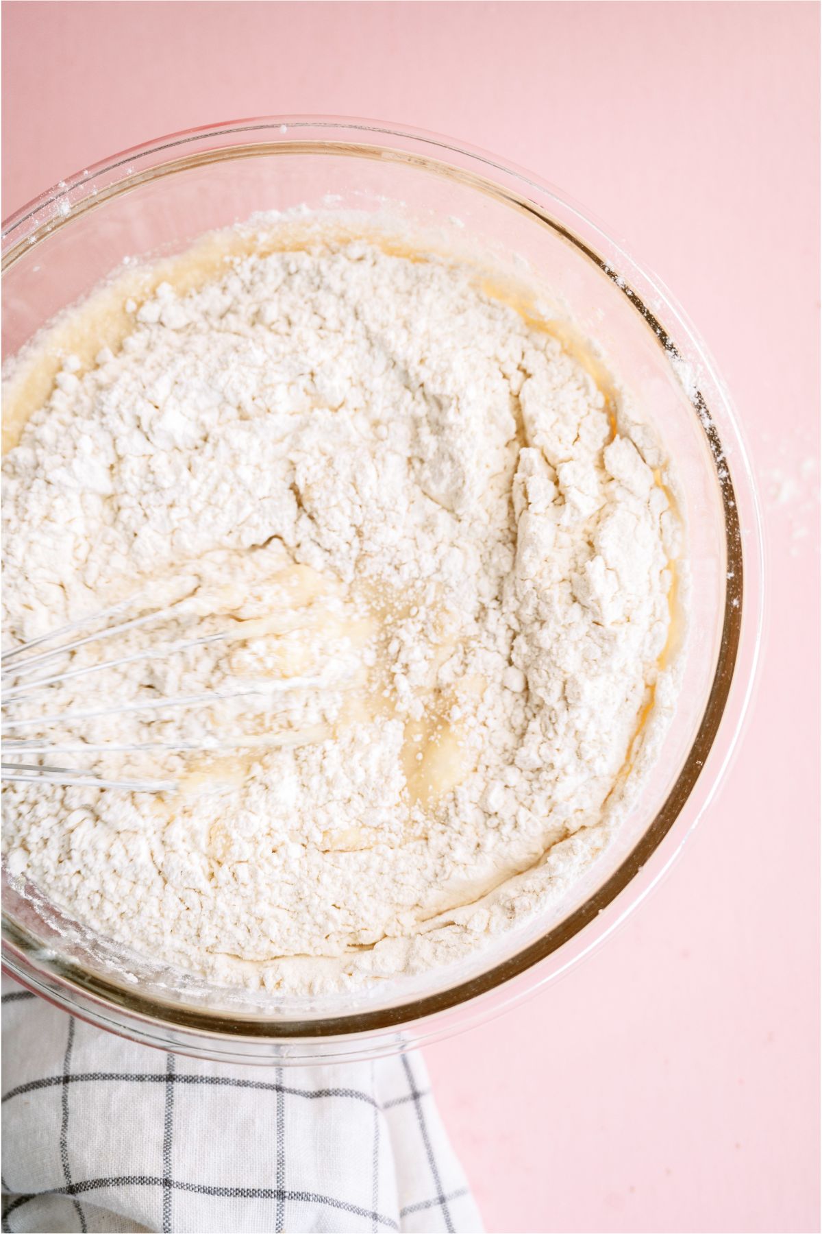 Whisking dry ingredients in to make Homemade Funfetti Cake Batter