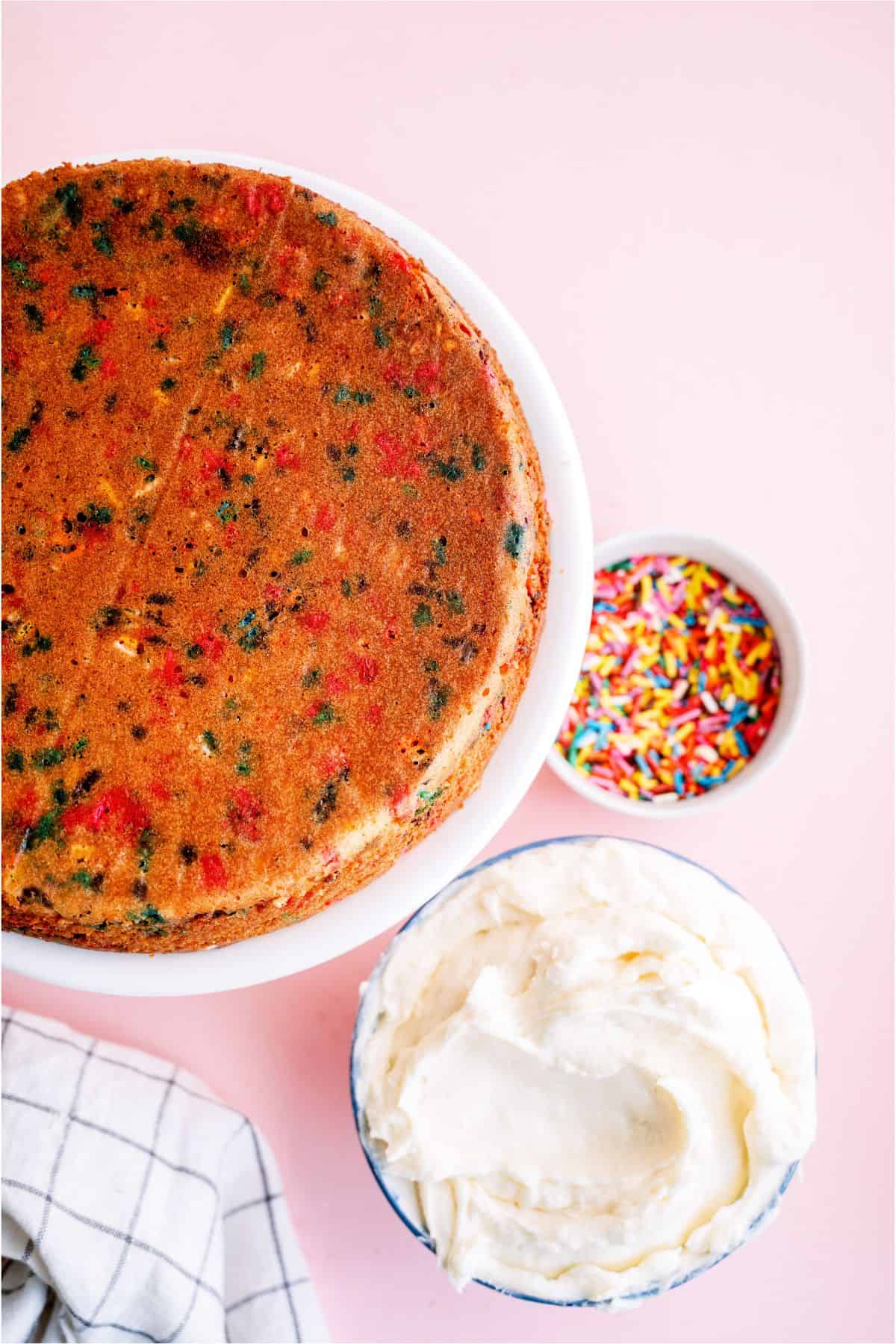 Baked Homemade Funfetti Cake without frosting on a cake stand