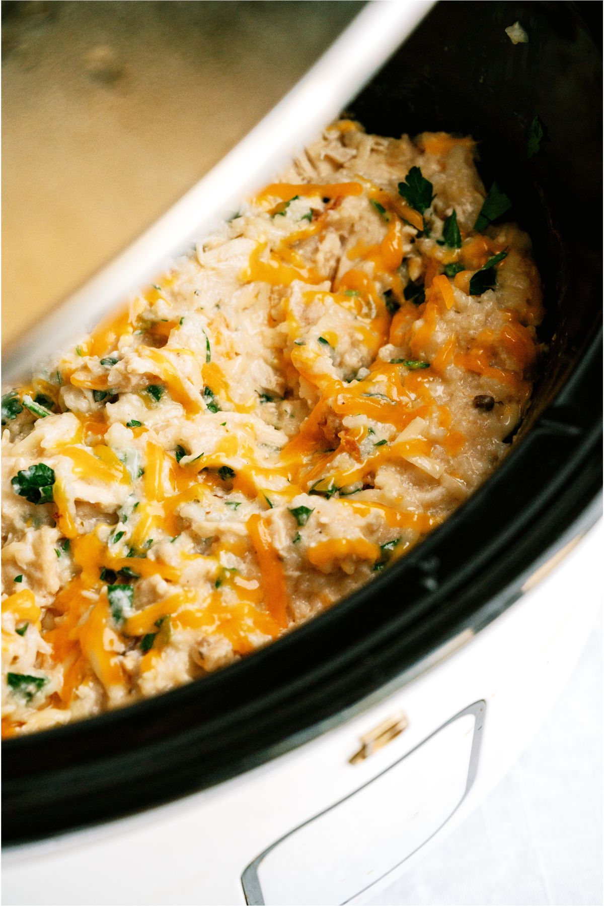 Slow Cooker Parmesan Chicken And Rice in the slow cooker