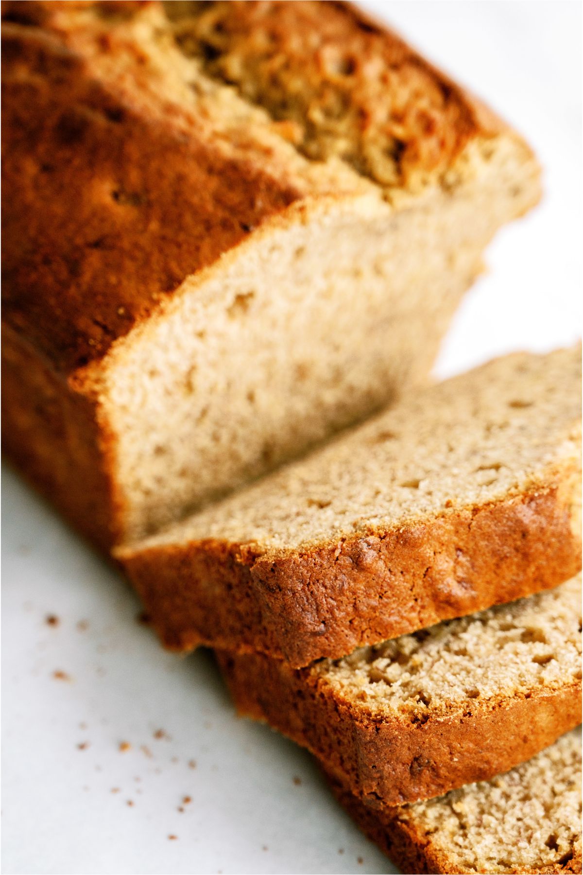 A loaf of Brown Butter Banana Bread sliced