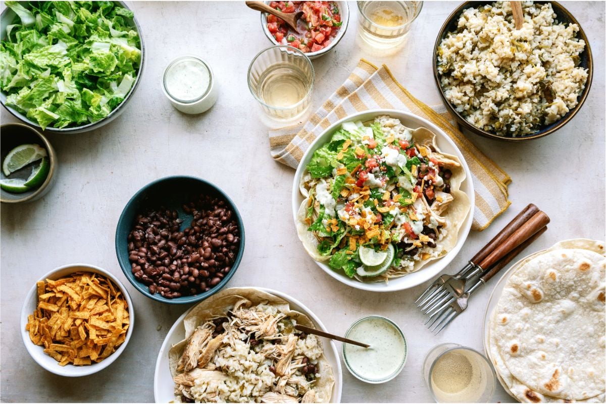 Ingredients to make Cafe Rio Slow Cooker Chicken and Cilantro Rice  bowls with toppings