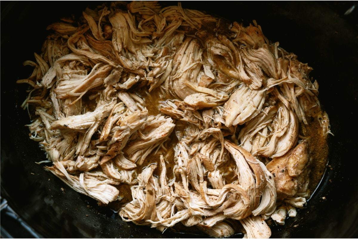 Cafe Rio Slow Cooker Chicken shredded in the slow cooker