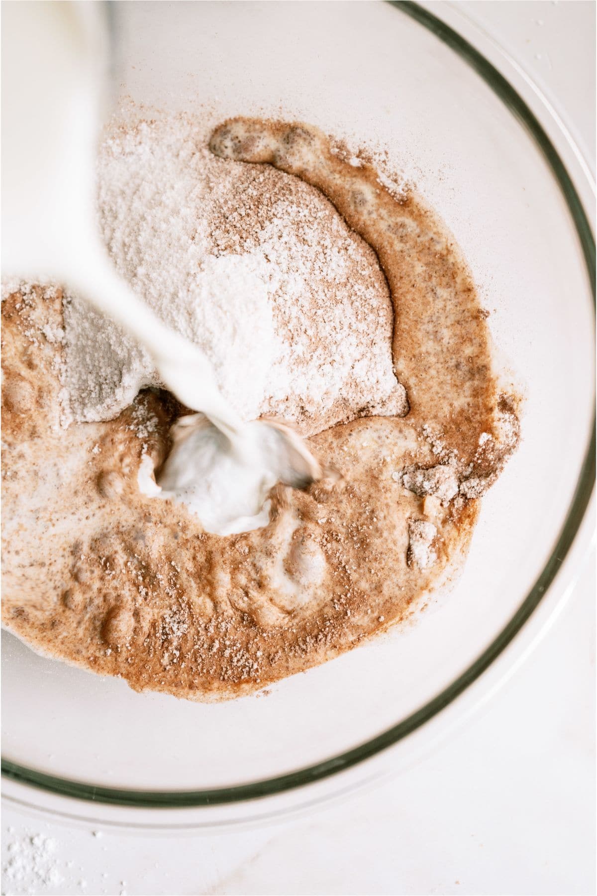 Making chocolate pudding mixture in a mixing bowl